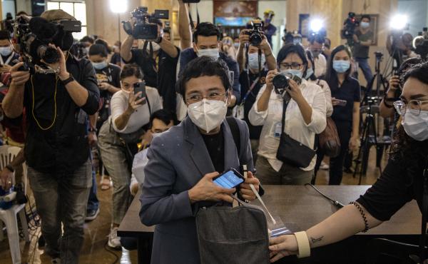 Maria Ressa, CEO of the Rappler news site, leaves a Philippine regional trial court after being convicted for cyber libel on June 15. Ressa, a veteran journalist and outspoken critic of President Rodrigo Duterte, is the focus of A Thousand Cuts, a documen Maria Ressa, CEO of the Rappler news site, leaves a Philippine regional trial court after being convicted for cyber libel on June 15. Ressa, a veteran journalist and outspoken critic of President Rodrigo Duterte, is the focus of A Thousand Cuts, a documen