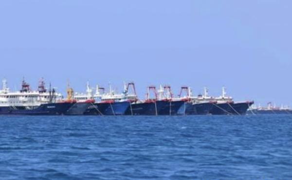 Some of the 220 Chinese vessels are seen moored in early March at the Whitsun Reef in the South China Sea. Some of the 220 Chinese vessels are seen moored in early March at the Whitsun Reef in the South China Sea.