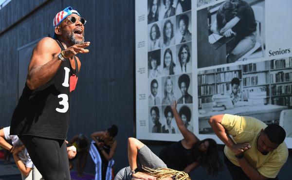 Marlon F. Hall leads a yoga class next to Interstate 244, which runs through the Tulsa neighborhood of Greenwood, the location of the Tulsa Race Massacre 100 years ago. Tulsa's celebration of Juneteenth comes less than three weeks after the anniversary. Marlon F. Hall leads a yoga class next to Interstate 244, which runs through the Tulsa neighborhood of Greenwood, the location of the Tulsa Race Massacre 100 years ago. Tulsa's celebration of Juneteenth comes less than three weeks after the anniversary.