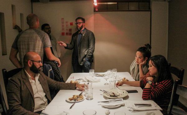 Make America Dinner Again guest Affan Khokhar (left, seated) talks with hosts Tria Chang and Justine Lee (front right, seated) after the dinner as guests (from left to right) Afam Agbodike, Walter Rodriguez and Nick Tucker continue their conversation. Make America Dinner Again guest Affan Khokhar (left, seated) talks with hosts Tria Chang and Justine Lee (front right, seated) after the dinner as guests (from left to right) Afam Agbodike, Walter Rodriguez and Nick Tucker continue their conversation.