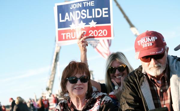 Supporters arrive for a President Trump rally in Valdosta, Ga., last weekend. Fewer than half of Trump backers said they would get the COVID-19 vaccine in a new poll. Supporters arrive for a President Trump rally in Valdosta, Ga., last weekend. Fewer than half of Trump backers said they would get the COVID-19 vaccine in a new poll.