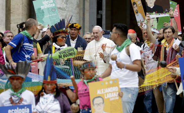 Pope Francis walks in procession on the occasion of the Amazon synod at the Vatican on Monday. The pope opened a three-week meeting as he fended off attacks from conservatives who are opposed to his ecological agenda. Pope Francis walks in procession on the occasion of the Amazon synod at the Vatican on Monday. The pope opened a three-week meeting as he fended off attacks from conservatives who are opposed to his ecological agenda.