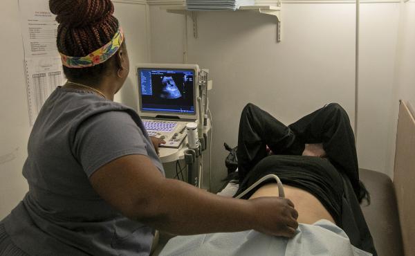 An operating room technician performs an ultrasound on a patient in Shreveport, La., on July 6, 2022. An operating room technician performs an ultrasound on a patient in Shreveport, La., on July 6, 2022.