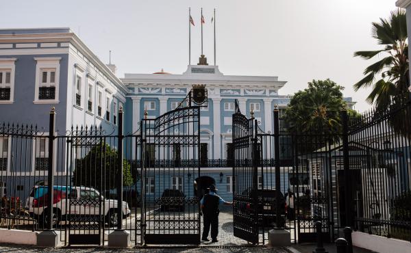 A security guard stands at the gate of the Governor's Mansion, known as the La Fortaleza, in San Juan, Puerto Rico. A security guard stands at the gate of the Governor's Mansion, known as the La Fortaleza, in San Juan, Puerto Rico.
