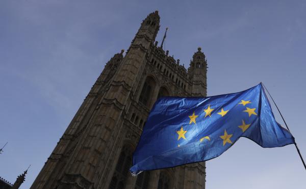 A European Union flag flies Monday outside the Parliament building in London. The multinational bloc has agreed to grant the U.K. another Brexit delay, bumping the deadline to the end of January. A European Union flag flies Monday outside the Parliament building in London. The multinational bloc has agreed to grant the U.K. another Brexit delay, bumping the deadline to the end of January.