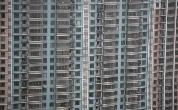 A residential building in Dandong, a city near China's northeast border with North Korea. Local authorities have tried to curb speculation in the property market. A residential building in Dandong, a city near China's northeast border with North Korea. Local authorities have tried to curb speculation in the property market.