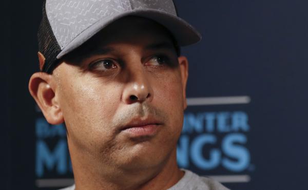 Boston Red Sox manager Alex Cora, pictured in December 2019, announced he is leaving the team in the wake of a Major League Baseball investigation that said he helped develop a sign-stealing system. Boston Red Sox manager Alex Cora, pictured in December 2019, announced he is leaving the team in the wake of a Major League Baseball investigation that said he helped develop a sign-stealing system.