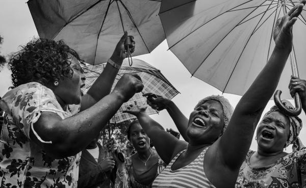 Ebola survivor Klubo Mulbah (center), a physician assistant who was infected by a patient, celebrates among friends and family on Sept. 24 in Monrovia, Liberia. She was among 15 Liberian patients who recovered from Ebola and were released from the ELWA 2 Ebola survivor Klubo Mulbah (center), a physician assistant who was infected by a patient, celebrates among friends and family on Sept. 24 in Monrovia, Liberia. She was among 15 Liberian patients who recovered from Ebola and were released from the ELWA 2