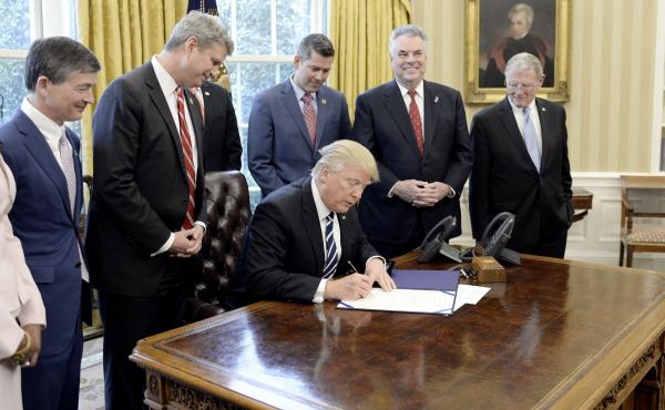 President Donald Trump signs a bill repealing a rule passed last July that required oil, gas and mining companies to disclose payments to overseas governments. The rule was meant to promote transparency. Critics of the repeal argue it served as an importa President Donald Trump signs a bill repealing a rule passed last July that required oil, gas and mining companies to disclose payments to overseas governments. The rule was meant to promote transparency. Critics of the repeal argue it served as an importa