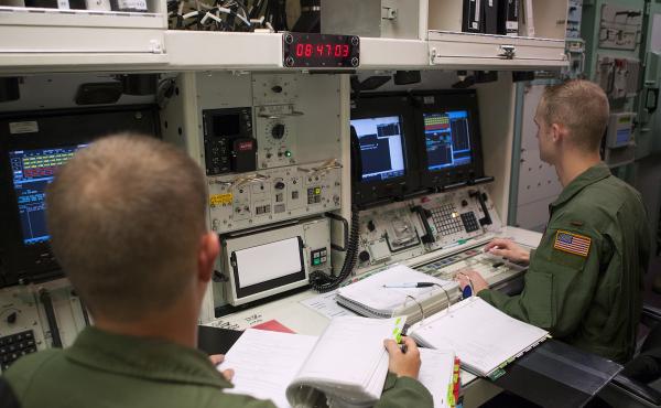 Members of the 320th Missile Squadron missile combat crew work through a scenario in the 90th Operations Support Squadron's Missile Procedure Trainer on F.E. Warren Air Force Base, Wyo., in June 2014. The MPT is a simulator that allows missile crews to pr Members of the 320th Missile Squadron missile combat crew work through a scenario in the 90th Operations Support Squadron's Missile Procedure Trainer on F.E. Warren Air Force Base, Wyo., in June 2014. The MPT is a simulator that allows missile crews to pr