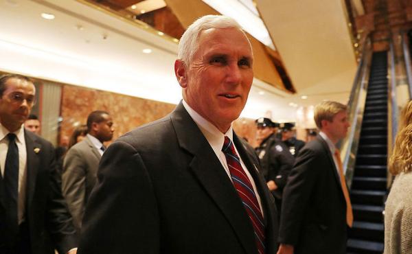 Vice President-elect Mike Pence, who is now overseeing President-elect Donald Trump's transition, walks by reporters while exiting Trump Tower on Tuesday. Vice President-elect Mike Pence, who is now overseeing President-elect Donald Trump's transition, walks by reporters while exiting Trump Tower on Tuesday.
