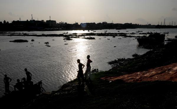 Two boys stand at the edge of the Buriganga River in Dhaka, Bangladesh, in July. A recent study finds that globally, boys and young men made up two-thirds of all deaths among young people in 2019. Two boys stand at the edge of the Buriganga River in Dhaka, Bangladesh, in July. A recent study finds that globally, boys and young men made up two-thirds of all deaths among young people in 2019.