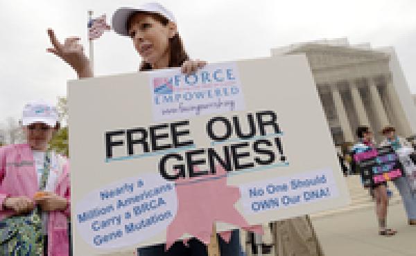 Lisa Schlager of Chevy Chase, Md., demonstrates outside of the Supreme Court as arguments were made in a case seeking to determine whether the BRCA breast cancer genes can be patented. The court ruled in 2013 that individual genes can't be patented. Lisa Schlager of Chevy Chase, Md., demonstrates outside of the Supreme Court as arguments were made in a case seeking to determine whether the BRCA breast cancer genes can be patented. The court ruled in 2013 that individual genes can't be patented.