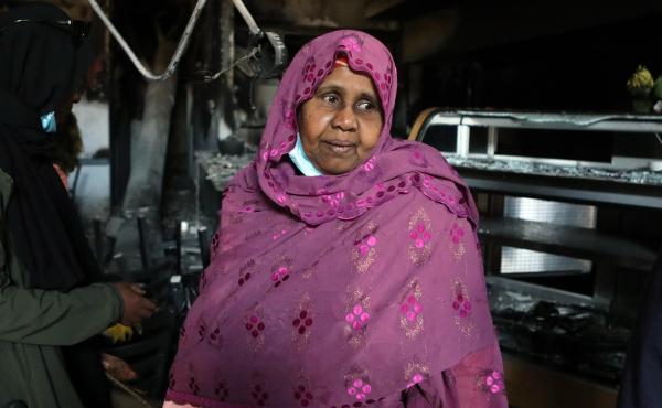 Safia Munye looks over the remains of her restaurant, Mama Safia's Kitchen, on Saturday. It was destroyed last week during protests in Minneapolis. Safia Munye looks over the remains of her restaurant, Mama Safia's Kitchen, on Saturday. It was destroyed last week during protests in Minneapolis.