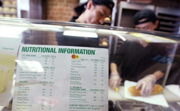 A sign displaying calorie counts is seen in a Subway restaurant in New York City in 2008. A yet-to-be-finalized federal rule requiring big chain restaurants to post calorie counts has likely led eateries to tweak their menus. A sign displaying calorie counts is seen in a Subway restaurant in New York City in 2008. A yet-to-be-finalized federal rule requiring big chain restaurants to post calorie counts has likely led eateries to tweak their menus.