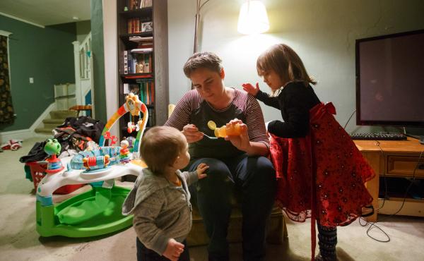 Four-year-old Violet (right) supervises as her mom Margaret Siebers pours a first-ever spoonful of honey for 1-year-old Frances to try. Siebers spent much of the end of her pregnancy with Frances confined to bed rest at her home in Milwaukee. Four-year-old Violet (right) supervises as her mom Margaret Siebers pours a first-ever spoonful of honey for 1-year-old Frances to try. Siebers spent much of the end of her pregnancy with Frances confined to bed rest at her home in Milwaukee.