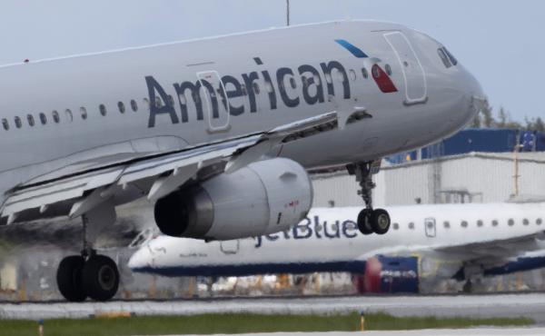 An American Airlines plane lands at the Fort Lauderdale-Hollywood International Airport on July 16, 2020. Air traffic has rebounded a bit but it's way below pre-coronavirus levels. An American Airlines plane lands at the Fort Lauderdale-Hollywood International Airport on July 16, 2020. Air traffic has rebounded a bit but it's way below pre-coronavirus levels.