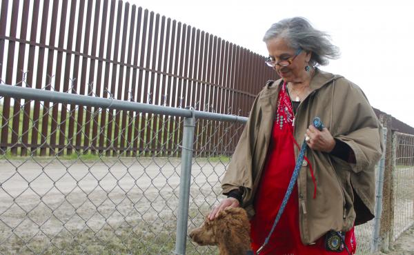Eloisa Tamez of El Calaboz, Texas, walks along the border wall in her backyard. She took the government to court over surveying her land and over the compensation she received for the land needed for border wall construction. Eloisa Tamez of El Calaboz, Texas, walks along the border wall in her backyard. She took the government to court over surveying her land and over the compensation she received for the land needed for border wall construction.