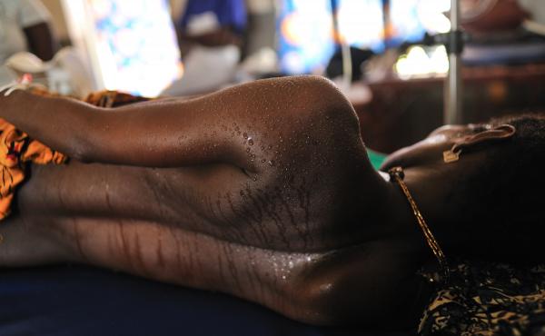 A woman in labor in the maternity ward at the Princess Christian Maternity Hospital in Freetown, Sierra Leone. With lockdowns have come fears of even greater numbers of home births. A woman in labor in the maternity ward at the Princess Christian Maternity Hospital in Freetown, Sierra Leone. With lockdowns have come fears of even greater numbers of home births.