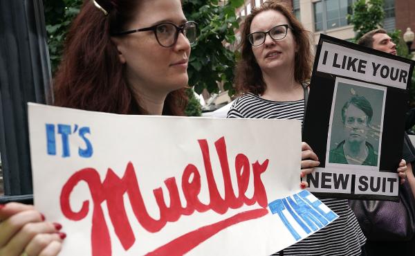 Activists protest outside the federal courthouse in Alexandria, Va., on July 31, 2018, the first day of the trial of former Trump campaign chairman Paul Manafort. Activists protest outside the federal courthouse in Alexandria, Va., on July 31, 2018, the first day of the trial of former Trump campaign chairman Paul Manafort.