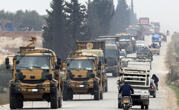 A Turkish military convoy drives in the east of Idlib on Feb. 28. A Turkish military convoy drives in the east of Idlib on Feb. 28.