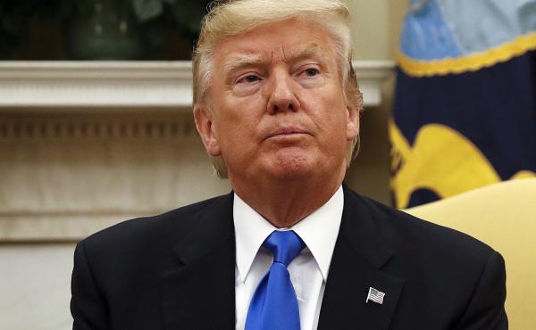 President Trump sits in the Oval Office of the White House in Washington on Tuesday. President Trump sits in the Oval Office of the White House in Washington on Tuesday.