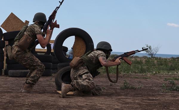 Service members of the 126th Separate Territorial Brigade of the Armed Forces of Ukraine take part in military exercises in the Odesa region on Wednesday. Service members of the 126th Separate Territorial Brigade of the Armed Forces of Ukraine take part in military exercises in the Odesa region on Wednesday.