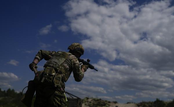 A civilian militia member holds a rifle during training at a shooting range on the outskirts of Kyiv on Tuesday. A civilian militia member holds a rifle during training at a shooting range on the outskirts of Kyiv on Tuesday.
