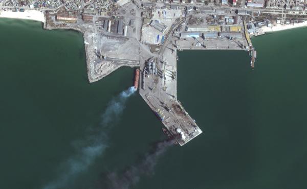 Maxar collected new satellite imagery of the southern Ukrainian port city of Berdyansk that reveals a Russian Alligator-class landing ship that is burned and partially submerged near one of the port's loading/unloading quays. Fire and smoke is also seen n Maxar collected new satellite imagery of the southern Ukrainian port city of Berdyansk that reveals a Russian Alligator-class landing ship that is burned and partially submerged near one of the port's loading/unloading quays. Fire and smoke is also seen n