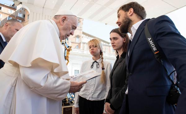 Wives of Ukrainian soldiers holed up inside the Azovstal steel plant in Mariupol meet with Pope Francis during the weekly general audience at the Vatican, Wednesday. Wives of Ukrainian soldiers holed up inside the Azovstal steel plant in Mariupol meet with Pope Francis during the weekly general audience at the Vatican, Wednesday.