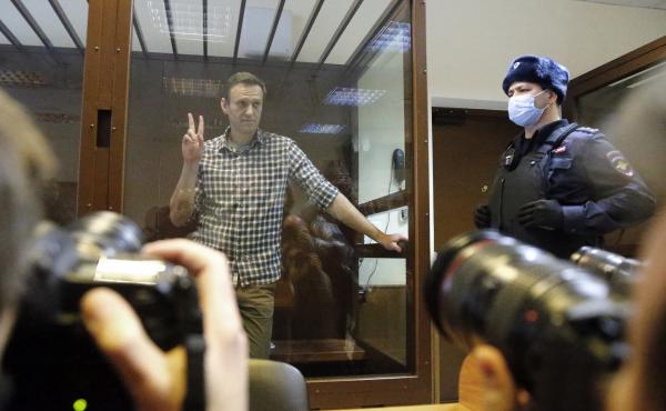 Russian opposition leader Alexei Navalny stands in a Moscow courtroom on Saturday. The court turned down an appeal against his prison sentence. Russian opposition leader Alexei Navalny stands in a Moscow courtroom on Saturday. The court turned down an appeal against his prison sentence.