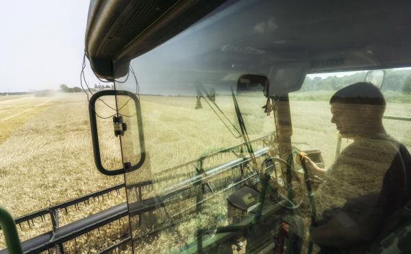 A driver sits in the cab of a combine harvester during the summer harvest in a field of wheat in Varva, Ukraine. Ukraine accounts for more than 10% of the global wheat market. Russia's war threatens to disrupt the spring planting season. A driver sits in the cab of a combine harvester during the summer harvest in a field of wheat in Varva, Ukraine. Ukraine accounts for more than 10% of the global wheat market. Russia's war threatens to disrupt the spring planting season.