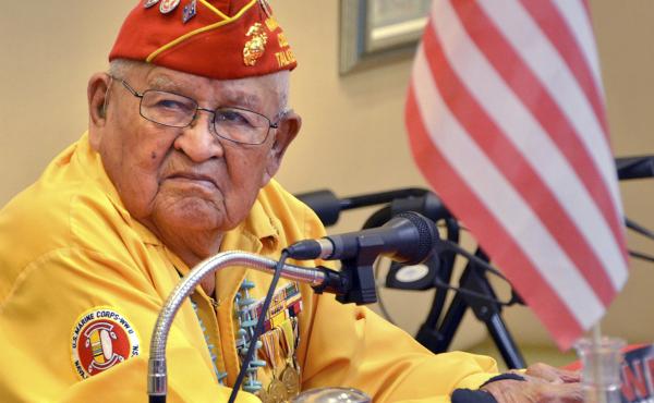 In this 2013 photo, Navajo Code Talker Samuel Sandoval talks about his experiences in the military. Sandoval, one of the last remaining Navajo Code Talkers who transmitted messages in World War II using a code based on their native language, has died at a In this 2013 photo, Navajo Code Talker Samuel Sandoval talks about his experiences in the military. Sandoval, one of the last remaining Navajo Code Talkers who transmitted messages in World War II using a code based on their native language, has died at a