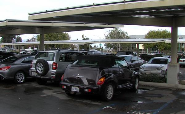 "Solar trees," which suspend solar panels over parking spaces in San Diego, collect electricity. Generating solar power like this is just one rung on a ladder the city will have to climb to reach 100 percent renewable energy by 2035. "Solar trees," which suspend solar panels over parking spaces in San Diego, collect electricity. Generating solar power like this is just one rung on a ladder the city will have to climb to reach 100 percent renewable energy by 2035.