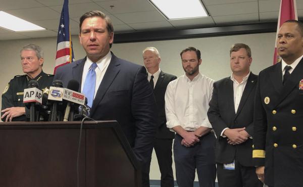 Florida Gov. Ron DeSantis says federal laws that allow foreign nationals to buy guns in the U.S. should be reviewed after a Saudi gunman carried out a mass shooting in Pensacola, Fla. DeSantis says, "The Second Amendment is so that we the American people Florida Gov. Ron DeSantis says federal laws that allow foreign nationals to buy guns in the U.S. should be reviewed after a Saudi gunman carried out a mass shooting in Pensacola, Fla. DeSantis says, "The Second Amendment is so that we the American people