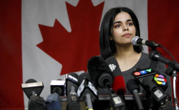 Rahaf Mohammed Alqunun, 18, addresses the media during a news conference at a refugee resettling agency in Toronto on Jan. 15. She pledged to "work in support of freedom for women around the world, the same freedom I experienced on the first day I arrived Rahaf Mohammed Alqunun, 18, addresses the media during a news conference at a refugee resettling agency in Toronto on Jan. 15. She pledged to "work in support of freedom for women around the world, the same freedom I experienced on the first day I arrived