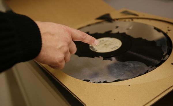 A 16-inch lacquer disc, a format used in the 1930s, from the collection of the Library of Congress. Most of the lacquer, the part of the disc where the sound was etched, has been lost to decay. A 16-inch lacquer disc, a format used in the 1930s, from the collection of the Library of Congress. Most of the lacquer, the part of the disc where the sound was etched, has been lost to decay.