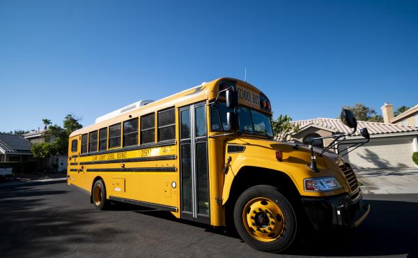 A Clark County, Nev., School District school bus drives through a Summerlin neighborhood last month. The National School Boards Association included an incident from Clark County in its letter to President Biden. A Clark County, Nev., School District school bus drives through a Summerlin neighborhood last month. The National School Boards Association included an incident from Clark County in its letter to President Biden.