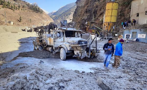 After a portion of the Nanda Devi glacier broke off in northern India on Sunday, people inspect a site near a damaged hydropower project at Reni village in Chamoli district in the country's Uttarakhand state. After a portion of the Nanda Devi glacier broke off in northern India on Sunday, people inspect a site near a damaged hydropower project at Reni village in Chamoli district in the country's Uttarakhand state.