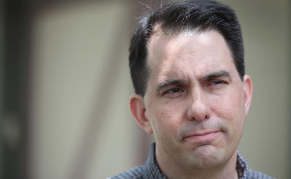 Gov. Scott Walker of Wisconsin speaking to reporters in West Des Moines, Iowa, earlier this month. Gov. Scott Walker of Wisconsin speaking to reporters in West Des Moines, Iowa, earlier this month.