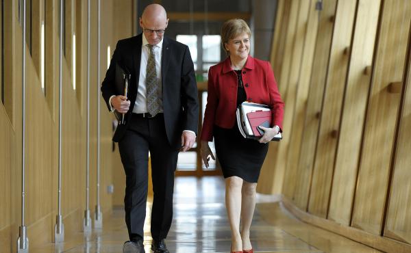 Scottish First Minister Nicola Sturgeon and Deputy First Minister John Swinney arrive at Scottish Parliament on Tuesday. They attended the second day of debate on a motion that ultimately granted Sturgeon the authority to pursue an independence referendum Scottish First Minister Nicola Sturgeon and Deputy First Minister John Swinney arrive at Scottish Parliament on Tuesday. They attended the second day of debate on a motion that ultimately granted Sturgeon the authority to pursue an independence referendum