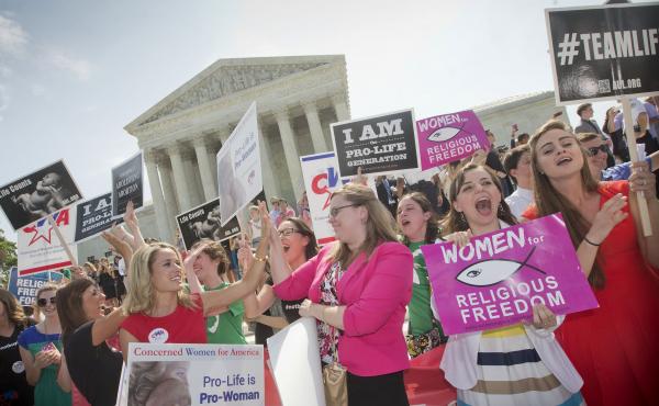 Demonstrators outside the U.S. Supreme Court in Washington, D.C., in 2014 react to hearing the court's decision on the Hobby Lobby birth control case. Demonstrators outside the U.S. Supreme Court in Washington, D.C., in 2014 react to hearing the court's decision on the Hobby Lobby birth control case.