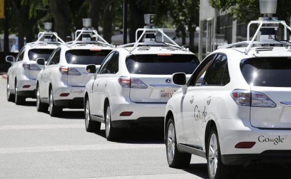 Google self-driving cars are shown outside the Computer History Museum in Mountain View, Calif., in May 2014. Google self-driving cars are shown outside the Computer History Museum in Mountain View, Calif., in May 2014.