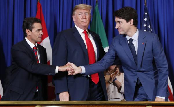 From left, then-Mexican President Enrique Peña Nieto, President Trump and Canadian Prime Minister Justin Trudeau participate in a USMCA signing ceremony in November 2018 in Buenos Aires, Argentina. From left, then-Mexican President Enrique Peña Nieto, President Trump and Canadian Prime Minister Justin Trudeau participate in a USMCA signing ceremony in November 2018 in Buenos Aires, Argentina.
