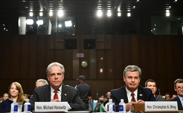 Justice Department Inspector General Michael Horowitz and FBI Director Christopher Wray wait to testify before the Senate Judiciary Committee on Monday. Justice Department Inspector General Michael Horowitz and FBI Director Christopher Wray wait to testify before the Senate Judiciary Committee on Monday.