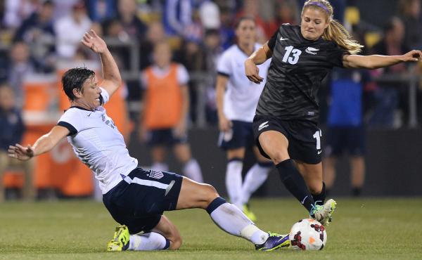 Dozens of elite women's soccer players have ended their fight against the use of turf at this summer's Women's World Cup. The plaintiffs included Abby Wambach, seen here in a 2013 US Women's National Team game. Dozens of elite women's soccer players have ended their fight against the use of turf at this summer's Women's World Cup. The plaintiffs included Abby Wambach, seen here in a 2013 US Women's National Team game.