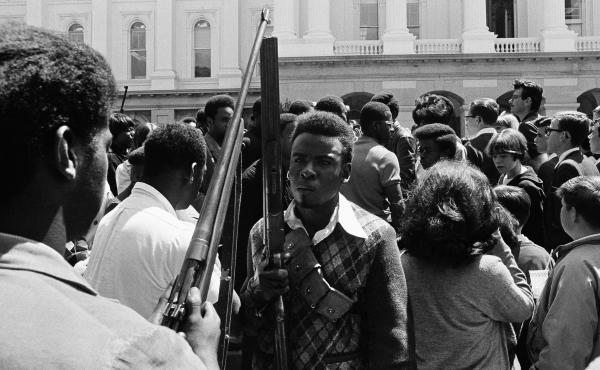 Armed members of the Black Panther Party leave the Capitol in Sacramento May 2, 1967. The Panthers entered the Capitol fully armed and said they were protesting a bill before the Legislature restricting the carrying of arms in public. Armed members of the Black Panther Party leave the Capitol in Sacramento May 2, 1967. The Panthers entered the Capitol fully armed and said they were protesting a bill before the Legislature restricting the carrying of arms in public.