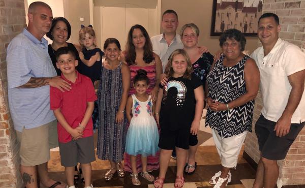 This photo from a trip last November shows the friends and family members whom Danielle Zonis (third from right) has chosen to quarantine with during the coronavirus pandemic. She started a Facebook group for others to discuss the choices they're making t This photo from a trip last November shows the friends and family members whom Danielle Zonis (third from right) has chosen to quarantine with during the coronavirus pandemic. She started a Facebook group for others to discuss the choices they're making t