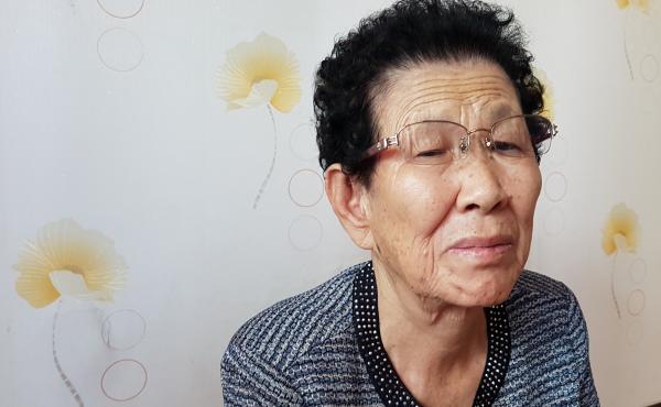 Ahn Seung-choon was 14 when her 17-year-old brother was taken away from the family home in Pyeongchang. "After that day, we didn't hear anything about him," Ahn says. Ahn Seung-choon was 14 when her 17-year-old brother was taken away from the family home in Pyeongchang. "After that day, we didn't hear anything about him," Ahn says.