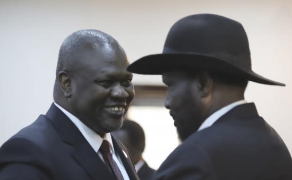 South Sudanese Vice President Riek Machar (left) shares a smile with President Salva Kiir after a swearing-in ceremony Saturday in the capital, Juba. Observers hope their newly forged coalition spells an end to civil war. South Sudanese Vice President Riek Machar (left) shares a smile with President Salva Kiir after a swearing-in ceremony Saturday in the capital, Juba. Observers hope their newly forged coalition spells an end to civil war.